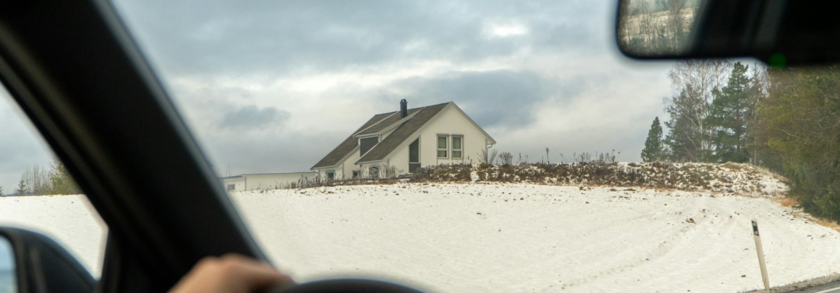 Driving by a rural house